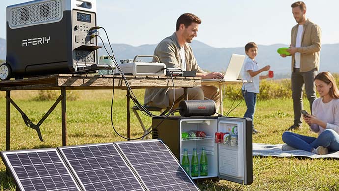 AFERIY 3840Wh Portable Solar Generator charged via solar panel in outdoor and kids are playing, parents are working.